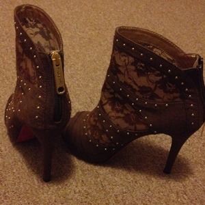 Brown, 3.5in heeled peep-toe booties.
