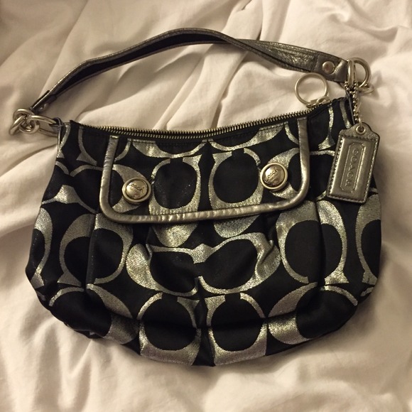 Authentic Coach with Silver Lettering.