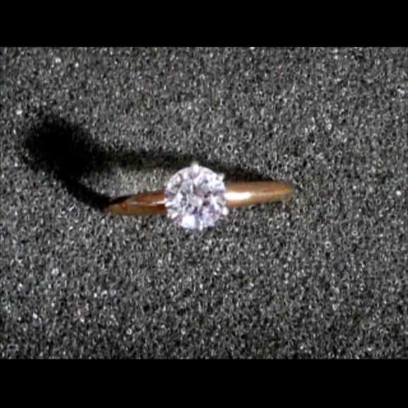 14k gold size 5 cubic ring. 1/4 carat