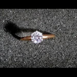 14k gold size 5 cubic ring. 1/4 carat