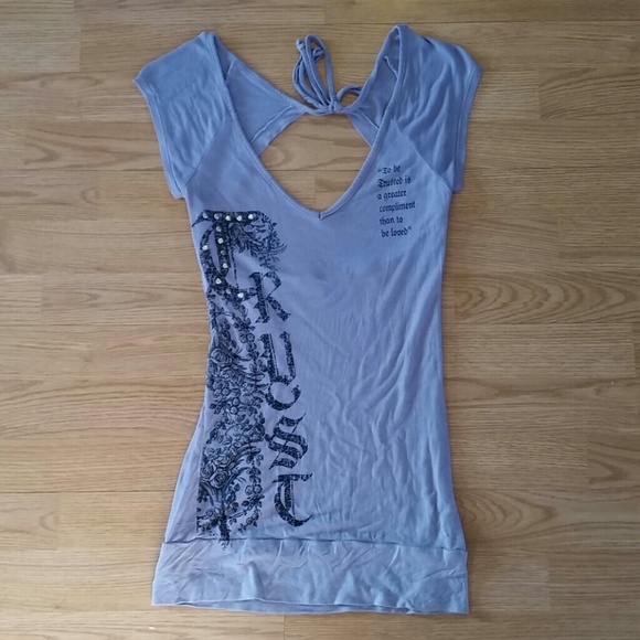 Gorgeous tunic length top with exposed back