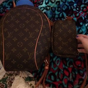 Louis Vitton backpack with matching wallet