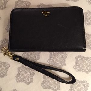 Fossil wristlet. Holds iPhone, cards, and coins