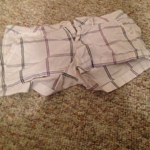 White Shorts with purple and grey stripes