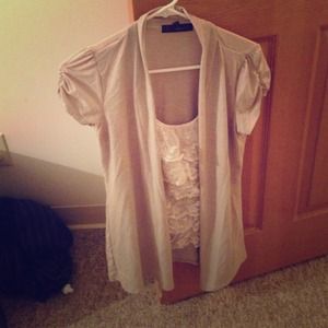 Grey sweater attached with a lace undershirt.