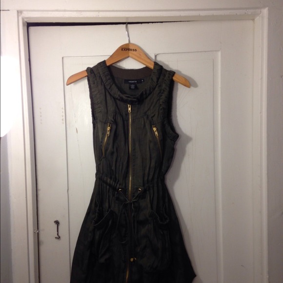 Green vest with silver bangles