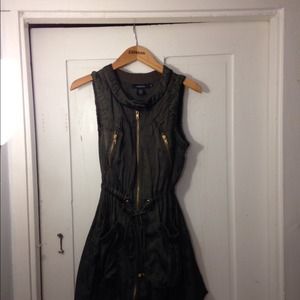 Green vest with silver bangles