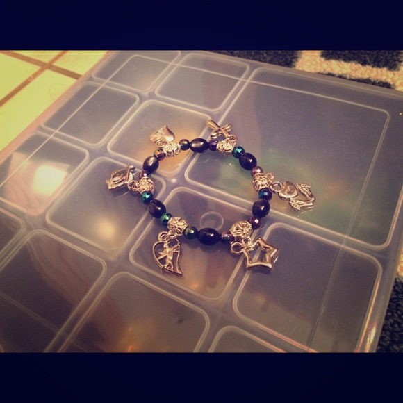 Stretchy black, green, and silver bracelet