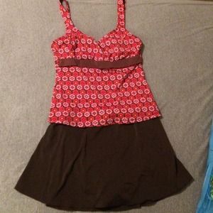 Woman used swimming suit. Size L.