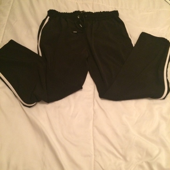 Black satin material like joggers