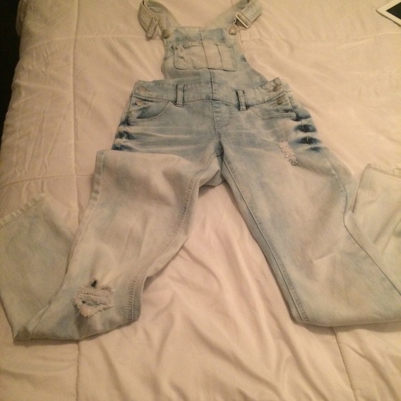 Distressed skinny leg overalls