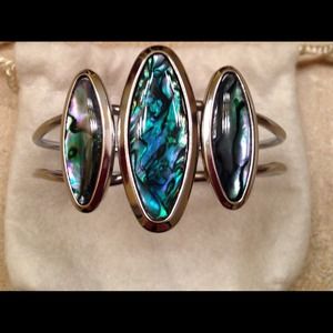 Silver cuff bracelet with bluish green inlay stone