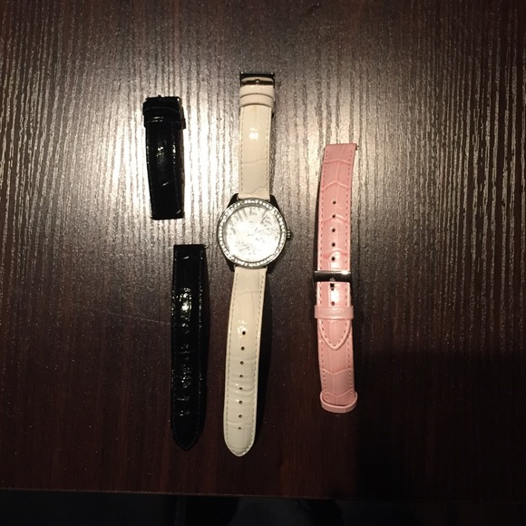 Guess watch with 3 interchangeable bands.