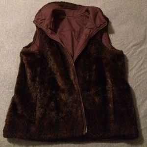 Double reversible vest. Size L. Used.