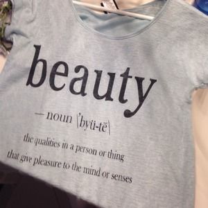 Mint blue tee with the definition of beauty