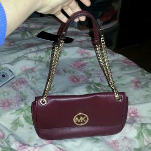 Michael kors burgundy purse new but dont have tags