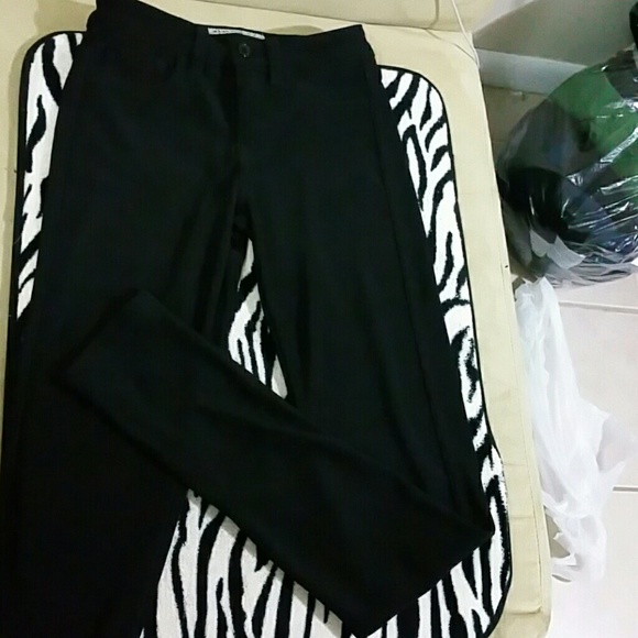 High waisted, riding inspired pants.