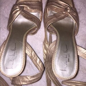 Shiny gold, 4 inch heels, that tie up or down