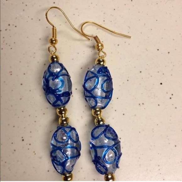Handcrafted blue swirl and gold earrings