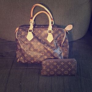 Non authentic Louis Vuitton with matching wallet .