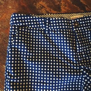 Blue and white polka dot shorts.