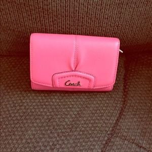 Light pink coach wallet.