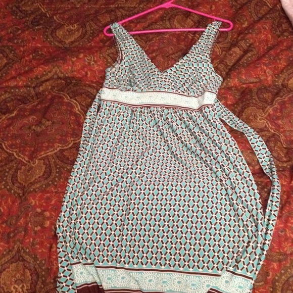 Blue turquoise dress with brown at the end