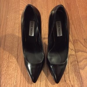 Black Steve Madden pumps, size 7.