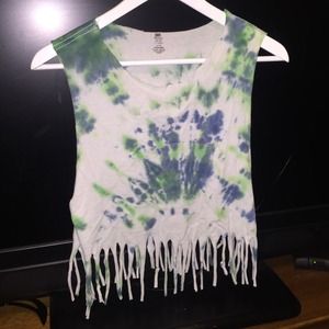 This is a cropped tie dye with fringe at the ends