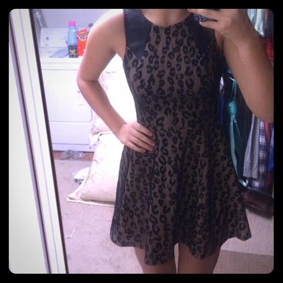 Free People Dresses & Skirts - Short, black and tan cheetah dress!