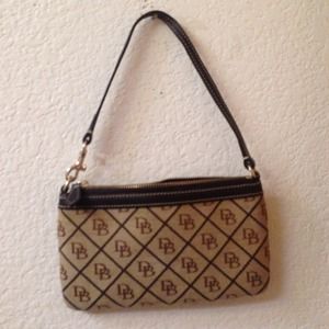 Dooney & Bourke wristlet. Price firm single item