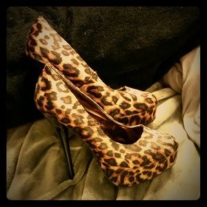 Leopard pumps.