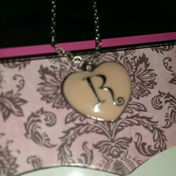 **R** Charmed necklace .. Lovely little heart