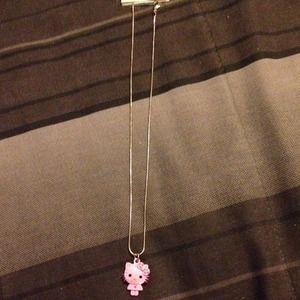 A Hello Kitty necklace