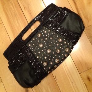 NWOT Black clutch with metallic embellishments NWOT Black clutch with metallic embellishments