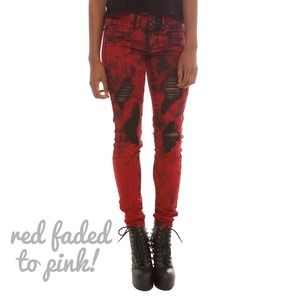 faded pink acid wash ripped skinny jeans.