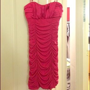 Hot pink cocktail dress with skinny straps.