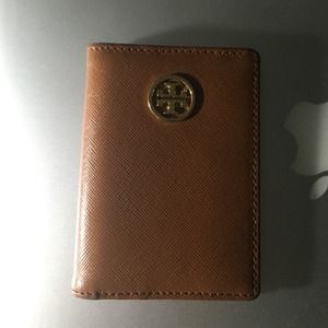 Tory burch passport wallet.
