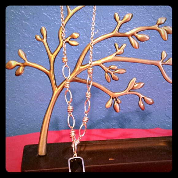 Silver tone necklace with faux black onyx