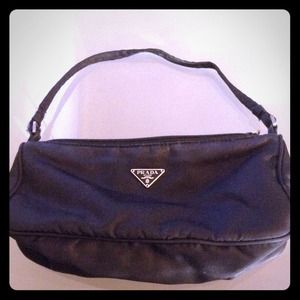 Small black purse by Prada