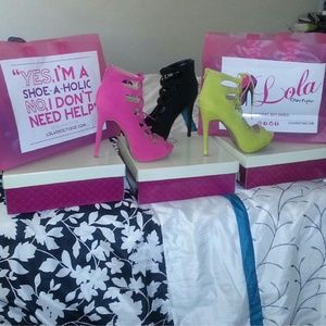 Pink open toe laced up booties