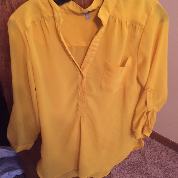 Bright yellow sheer top