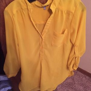 Bright yellow sheer top