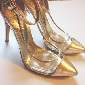 BCBGeneration metallic gold & clear pumps