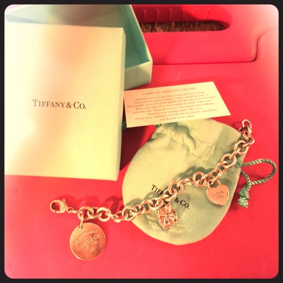 Mint con. Tiffany & Co charm bracelet and 2 charms