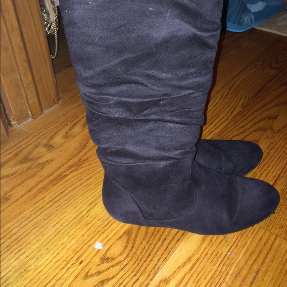 Tall black slouchy suede boots