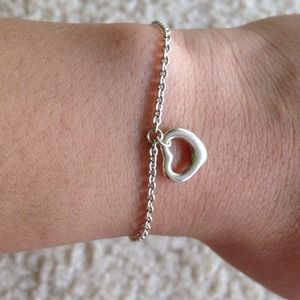 Tiffany &Co Peretti open heart bracelet.