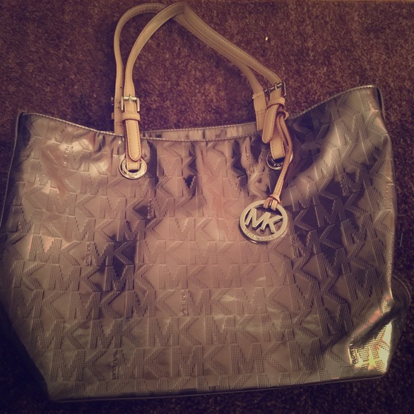 MK Metallic purse