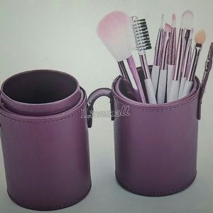 Brand new makeup brush with holder