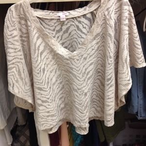 I'm selling a tan  crop top!!